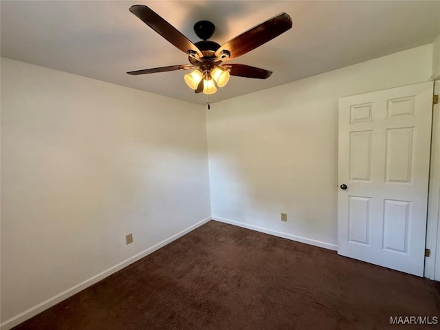 311 Old Marion Junction Rd, Selma, AL 36701 - empty room featuring a ceiling fan and dark colored carpet