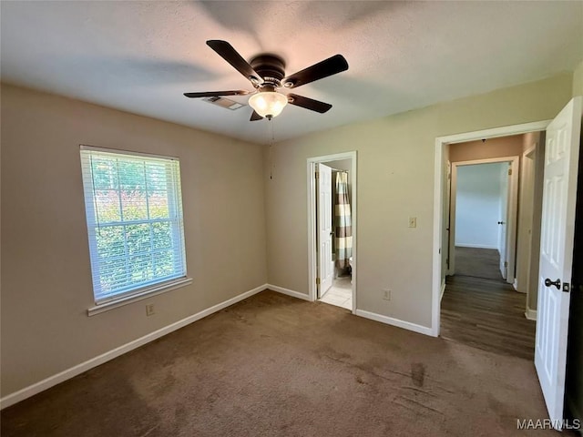 311 Old Marion Junction Rd, Selma, AL 36701 - unfurnished bedroom featuring carpet flooring, ensuite bathroom, and ceiling fan