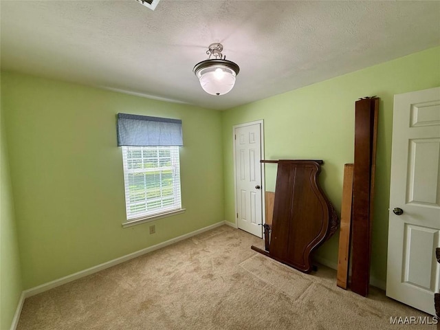 311 Old Marion Junction Rd, Selma, AL 36701 - unfurnished bedroom featuring light carpet and baseboards