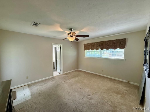311 Old Marion Junction Rd, Selma, AL 36701 - empty room with a ceiling fan and light carpet