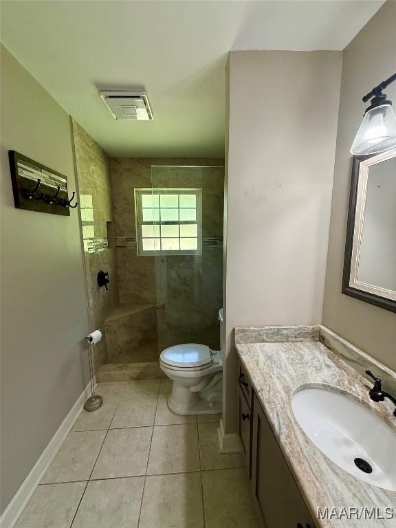 311 Old Marion Junction Rd, Selma, AL 36701 - full bathroom featuring vanity, a walk in shower, and tile patterned flooring