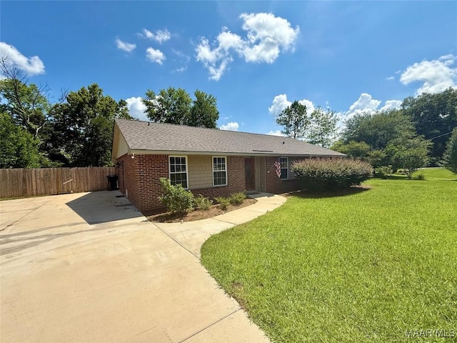 311 Old Marion Junction Rd, Selma, AL 36701 - ranch-style home with concrete driveway, brick siding, and a shingled roof