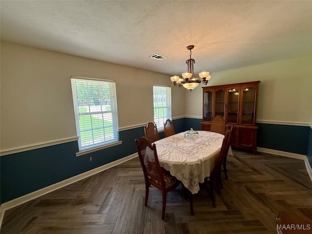 311 Old Marion Junction Rd, Selma, AL 36701 - dining room featuring a chandelier and baseboards