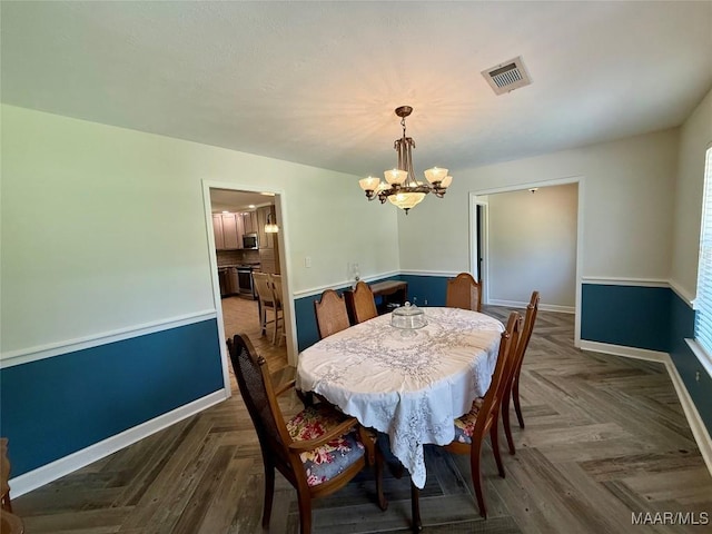 311 Old Marion Junction Rd, Selma, AL 36701 - dining space featuring a chandelier and baseboards