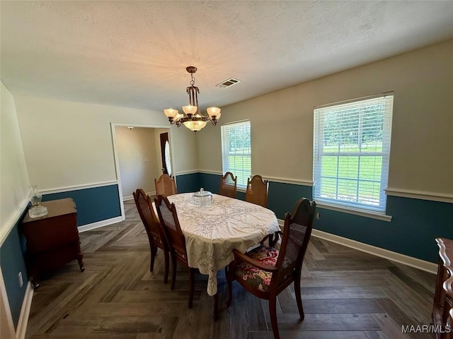 311 Old Marion Junction Rd, Selma, AL 36701 - dining space with a chandelier and a textured ceiling