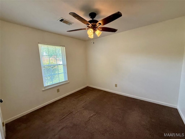 311 Old Marion Junction Rd, Selma, AL 36701 - empty room featuring ceiling fan and dark colored carpet