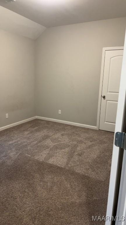 1008 Overture Dr, Montgomery, AL 36117 - unfurnished room with dark carpet and lofted ceiling