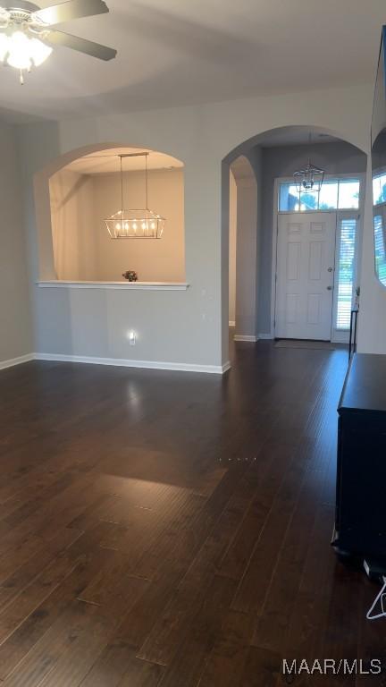 1008 Overture Dr, Montgomery, AL 36117 - entryway featuring dark wood-style floors, arched walkways, a ceiling fan, and a chandelier