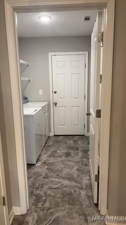 1008 Overture Dr, Montgomery, AL 36117 - laundry room featuring washing machine and clothes dryer