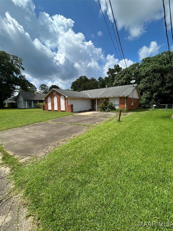 756 Maryethel Dr, Montgomery, AL 36109 - single story home with brick siding, asphalt driveway, and a front lawn