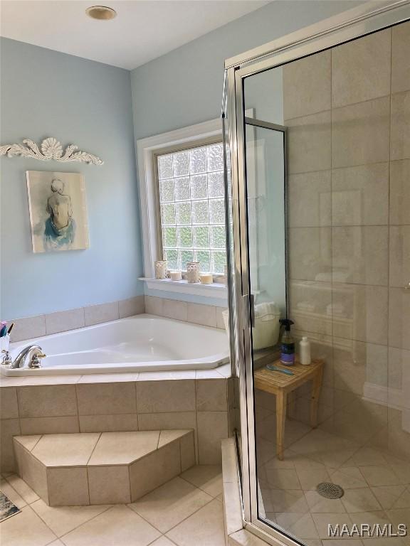5650 Ash Grove Ct, Montgomery, AL 36116 - full bathroom featuring a garden tub, tile patterned flooring, and a shower stall