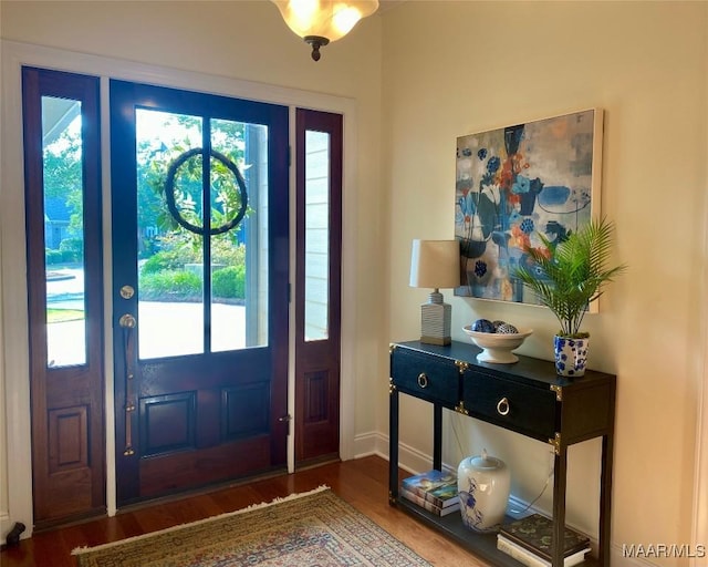 5650 Ash Grove Ct, Montgomery, AL 36116 - foyer entrance with healthy amount of natural light and wood finished floors