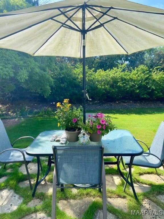 5650 Ash Grove Ct, Montgomery, AL 36116 - view of patio / terrace with outdoor dining area