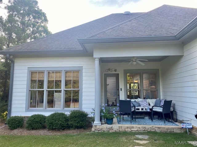 5650 Ash Grove Ct, Montgomery, AL 36116 - view of exterior entry with a ceiling fan, a shingled roof, and an outdoor living space