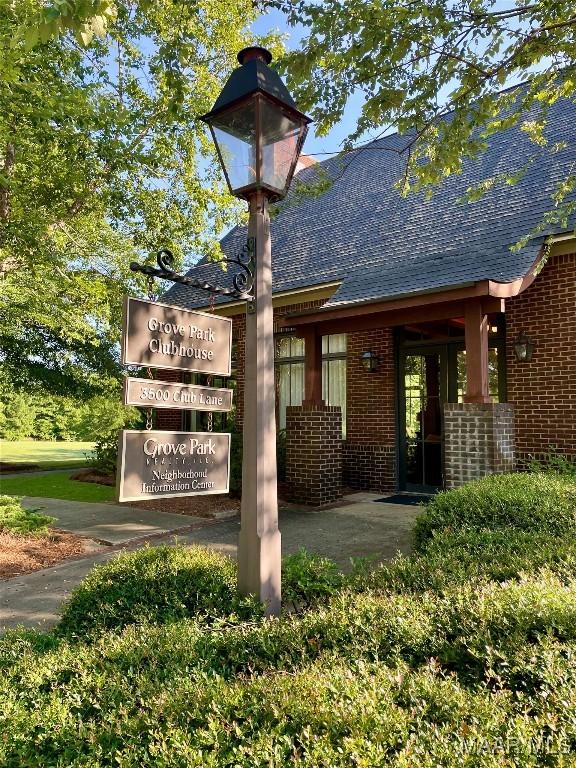 5650 Ash Grove Ct, Montgomery, AL 36116 - exterior view of brick siding and a shingled roof