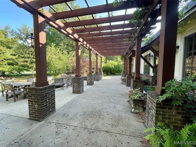 5650 Ash Grove Ct, Montgomery, AL 36116 - view of patio with outdoor dining space and a pergola