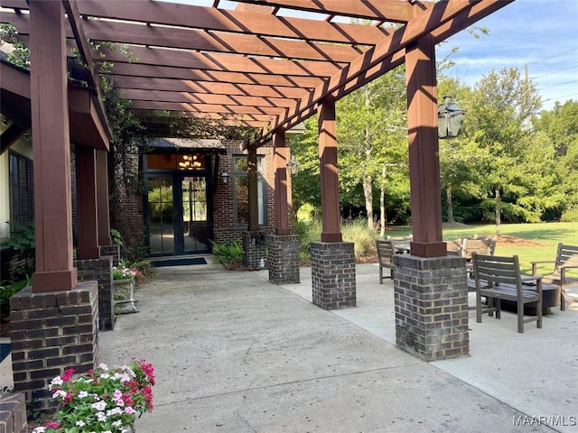 5650 Ash Grove Ct, Montgomery, AL 36116 - view of patio featuring french doors, a pergola, and outdoor dining space