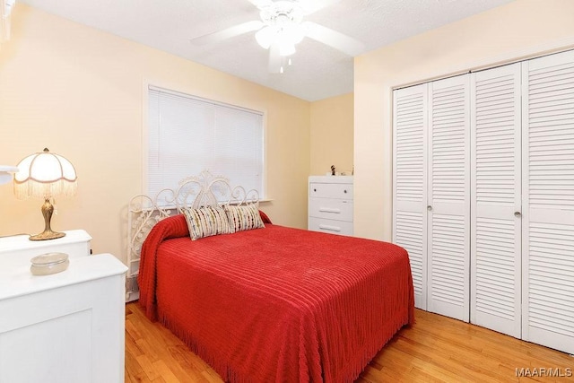 471 Beachwood Rd, Wetumpka, AL 36092 - bedroom with light wood-type flooring, a closet, and a ceiling fan