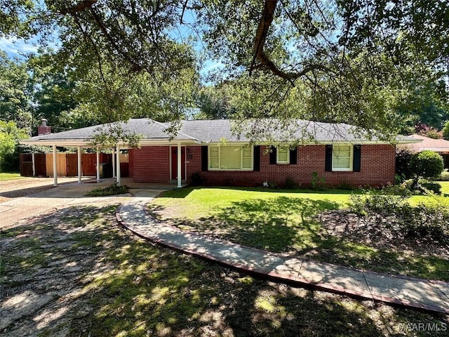 3551 Dalraida Pkwy, Montgomery, AL 36109 - single story home featuring an attached carport, concrete driveway, and brick siding