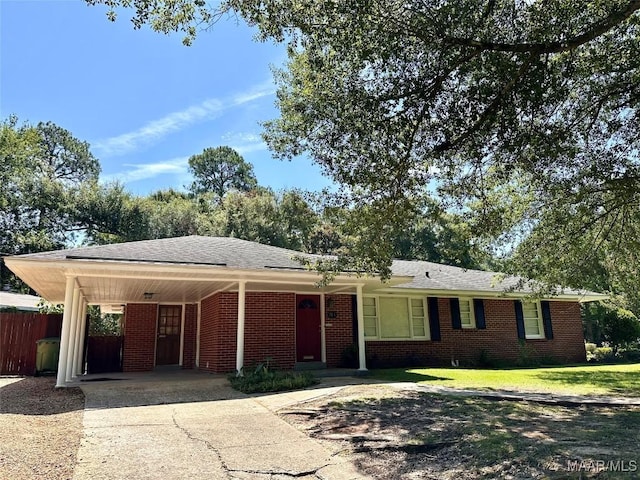 3551 Dalraida Pkwy, Montgomery, AL 36109 - single story home with driveway, brick siding, and a carport
