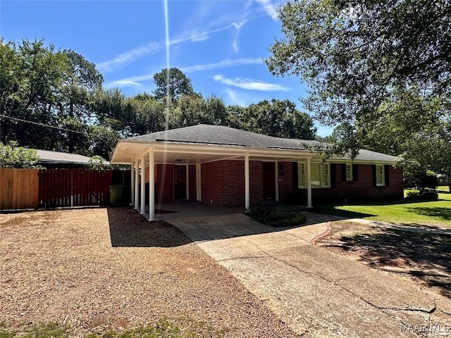 3551 Dalraida Pkwy, Montgomery, AL 36109 - ranch-style house with driveway, an attached carport, and brick siding