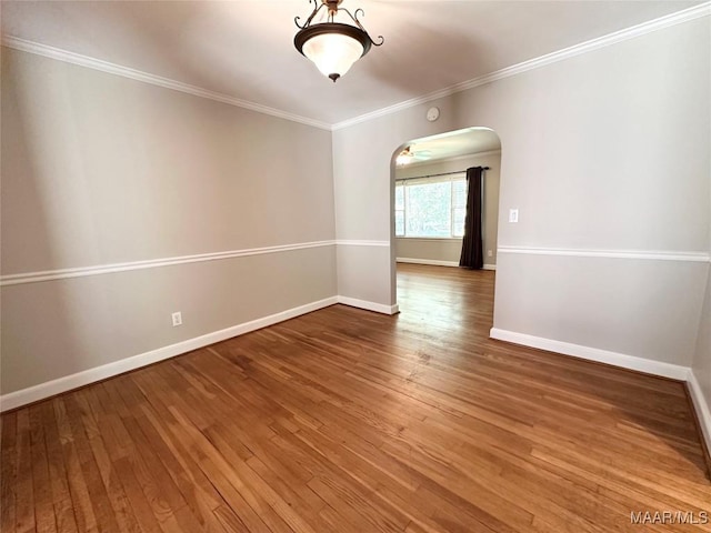 3551 Dalraida Pkwy, Montgomery, AL 36109 - unfurnished room featuring arched walkways, hardwood / wood-style floors, and ornamental molding