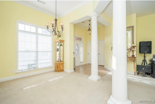 9832 Helmsley Cir, Montgomery, AL 36117 - unfurnished dining area with ornate columns, carpet flooring, crown molding, and a chandelier