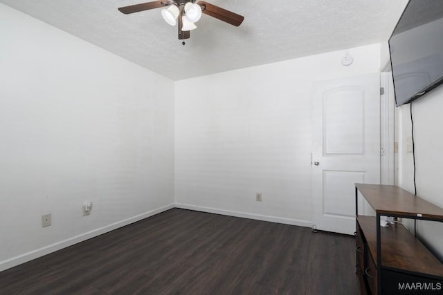 6526 Ridgeview Ln, Montgomery, AL 36116 - spare room with dark wood-style flooring, a ceiling fan, and a textured ceiling