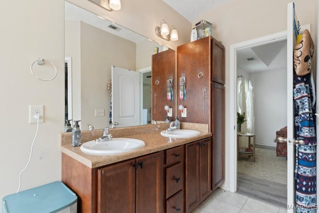 6526 Ridgeview Ln, Montgomery, AL 36116 - bathroom featuring double vanity and tile patterned floors