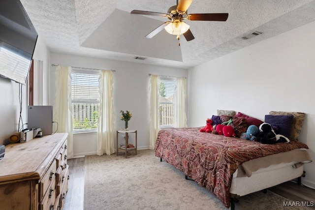6526 Ridgeview Ln, Montgomery, AL 36116 - bedroom with a textured ceiling and a ceiling fan