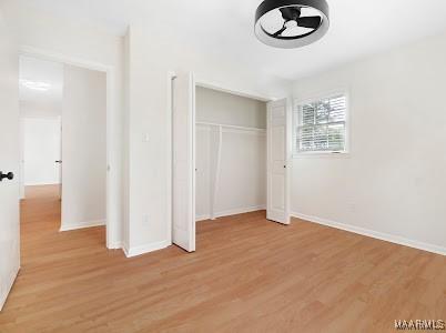1243 Highpoint Rd, Montgomery, AL 36109 - unfurnished bedroom featuring light wood finished floors and a closet