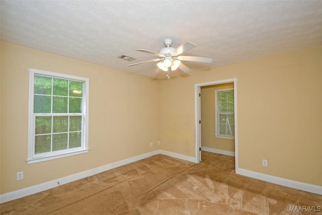 134 Taylor Hill Dr, Wetumpka, AL 36092 - unfurnished room featuring healthy amount of natural light, carpet flooring, ceiling fan, and a textured ceiling