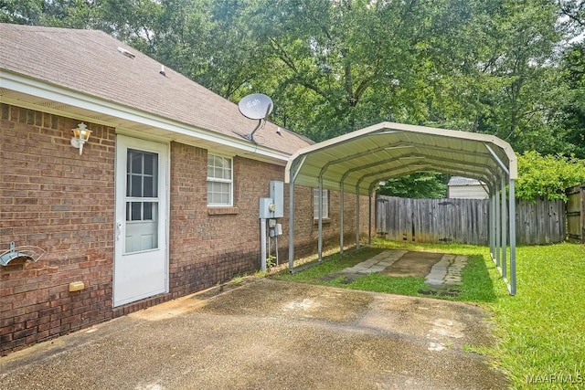 134 Taylor Hill Dr, Wetumpka, AL 36092 - view of vehicle parking with driveway and a detached carport