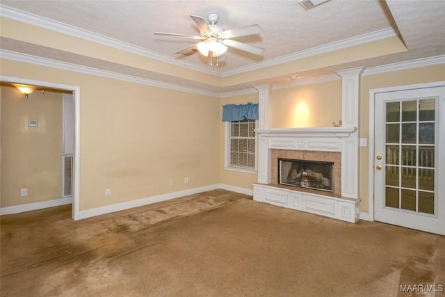 134 Taylor Hill Dr, Wetumpka, AL 36092 - unfurnished living room with carpet floors, a tray ceiling, a fireplace, a ceiling fan, and crown molding
