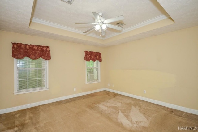 134 Taylor Hill Dr, Wetumpka, AL 36092 - empty room featuring a raised ceiling, ornamental molding, carpet flooring, ceiling fan, and a textured ceiling