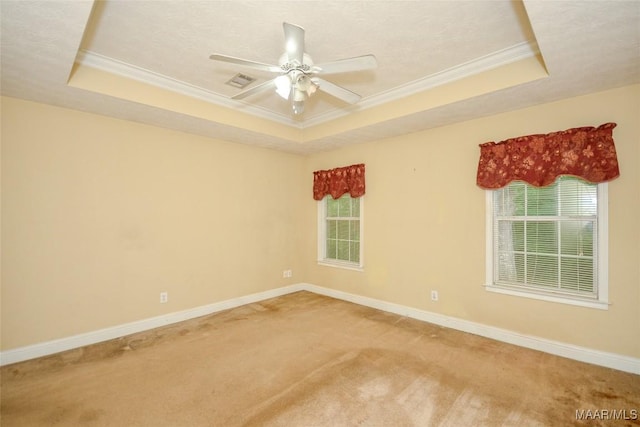 134 Taylor Hill Dr, Wetumpka, AL 36092 - empty room featuring a raised ceiling, ornamental molding, carpet floors, and a ceiling fan