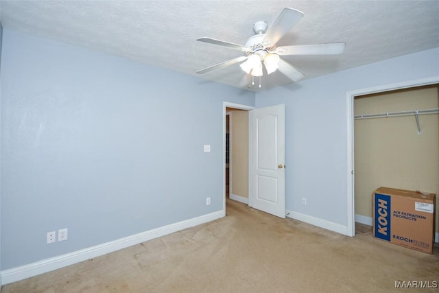 134 Taylor Hill Dr, Wetumpka, AL 36092 - unfurnished bedroom featuring a closet, carpet floors, a textured ceiling, and a ceiling fan