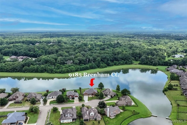 9185 Brenham Ct, Montgomery, AL 36117 - aerial perspective of suburban area featuring a forest and a large body of water