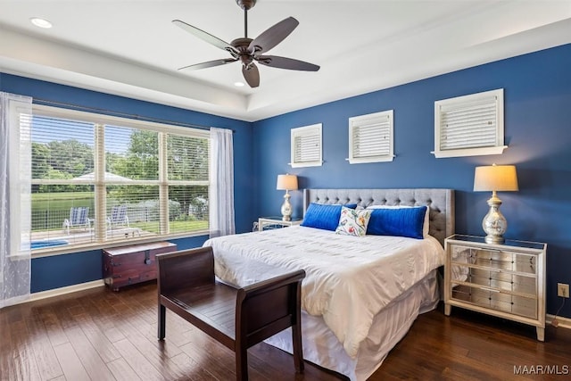 9185 Brenham Ct, Montgomery, AL 36117 - bedroom featuring hardwood / wood-style floors, recessed lighting, a ceiling fan, and a tray ceiling