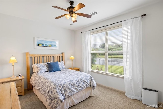 9185 Brenham Ct, Montgomery, AL 36117 - bedroom featuring light carpet and a ceiling fan