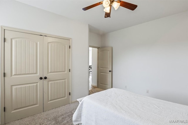 9185 Brenham Ct, Montgomery, AL 36117 - bedroom featuring carpet flooring, a closet, and a ceiling fan