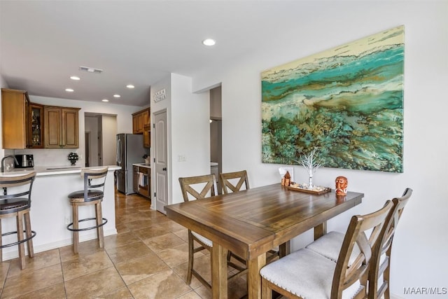 9185 Brenham Ct, Montgomery, AL 36117 - dining space with recessed lighting and light tile patterned flooring
