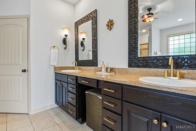 9185 Brenham Ct, Montgomery, AL 36117 - full bathroom featuring tile patterned floors, double vanity, and ceiling fan