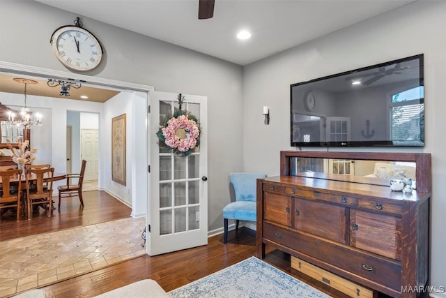 9185 Brenham Ct, Montgomery, AL 36117 - sitting room featuring wood-type flooring, ceiling fan, a chandelier, and recessed lighting