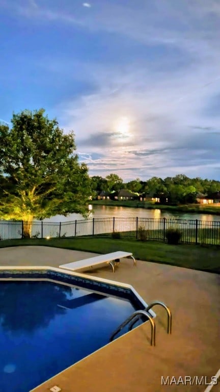 9185 Brenham Ct, Montgomery, AL 36117 - view of pool featuring a patio area, a water view, and a diving board