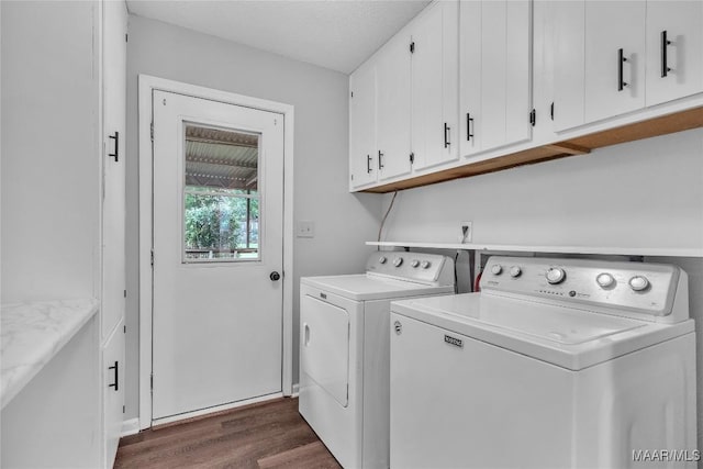 3213 Milan Dr, Montgomery, AL 36109 - laundry room featuring cabinet space, washer and dryer, and dark wood-style flooring