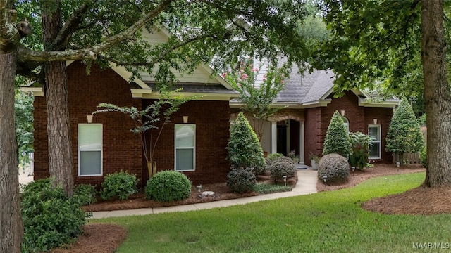 378 Winding Wood Dr, Wetumpka, AL 36093 - view of front of property featuring brick siding and a front lawn
