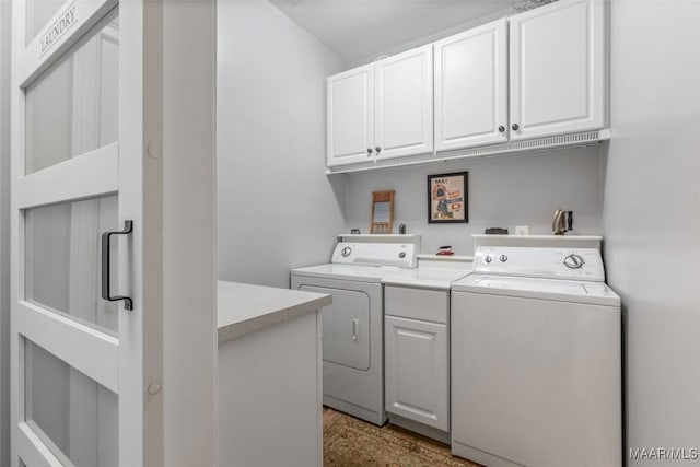 378 Winding Wood Dr, Wetumpka, AL 36093 - washroom with washer and dryer and cabinet space