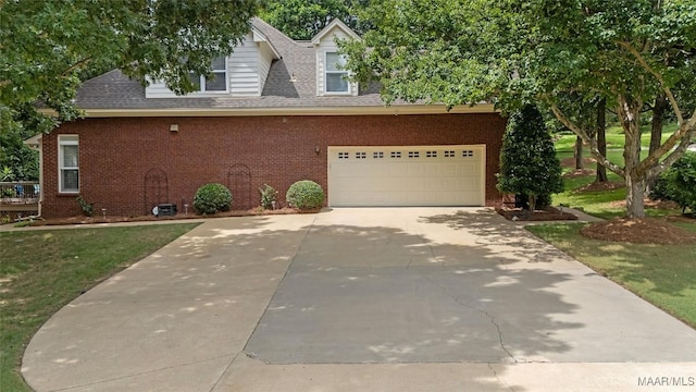 378 Winding Wood Dr, Wetumpka, AL 36093 - view of front of property featuring concrete driveway, brick siding, an attached garage, and a shingled roof
