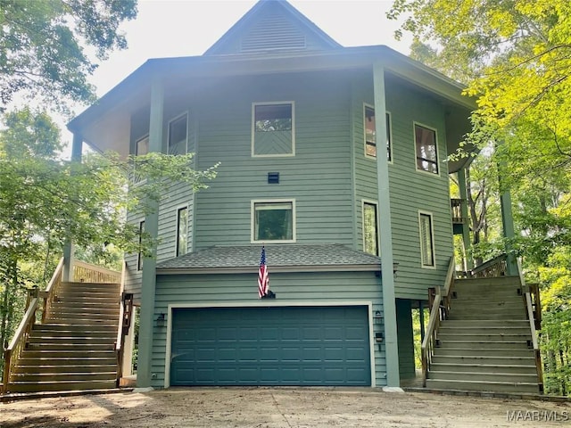 400 Millcreek Rd, Wetumpka, AL 36093 - view of front of home with stairs, a garage, and driveway